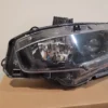 A close up of the headlight on a car