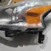 A close up of the headlight on a car