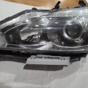 A car headlight is shown with the cover on.