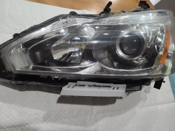 A car headlight is shown with the cover on.