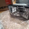 A clear plastic box with a light on it