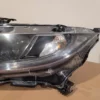 A close up of the headlight on a car