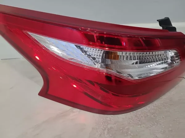 A close up of the tail light on a car