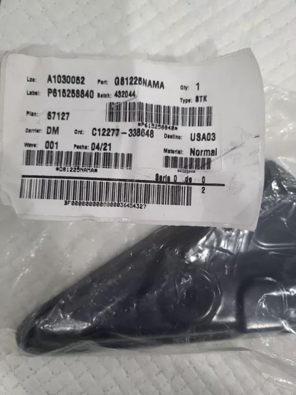 A plastic bag with some black items in it