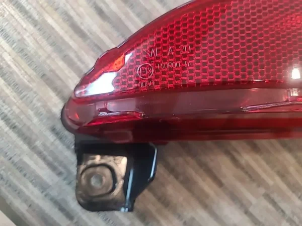 A close up of the side marker light on a car.