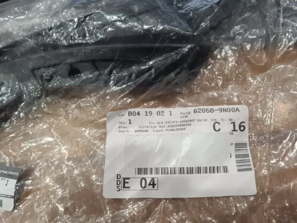 A package of black plastic with a tag on it.