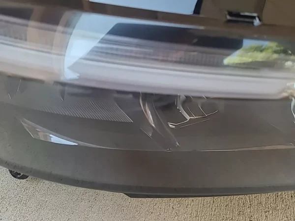 A glass table with a laptop on it