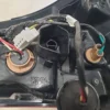 A close up of the wires on a motorcycle