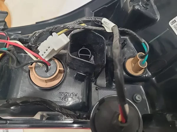 A close up of the wires on a motorcycle