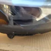 A car that is sitting in the dirt.