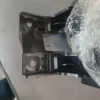 A metal object sitting on top of a table.