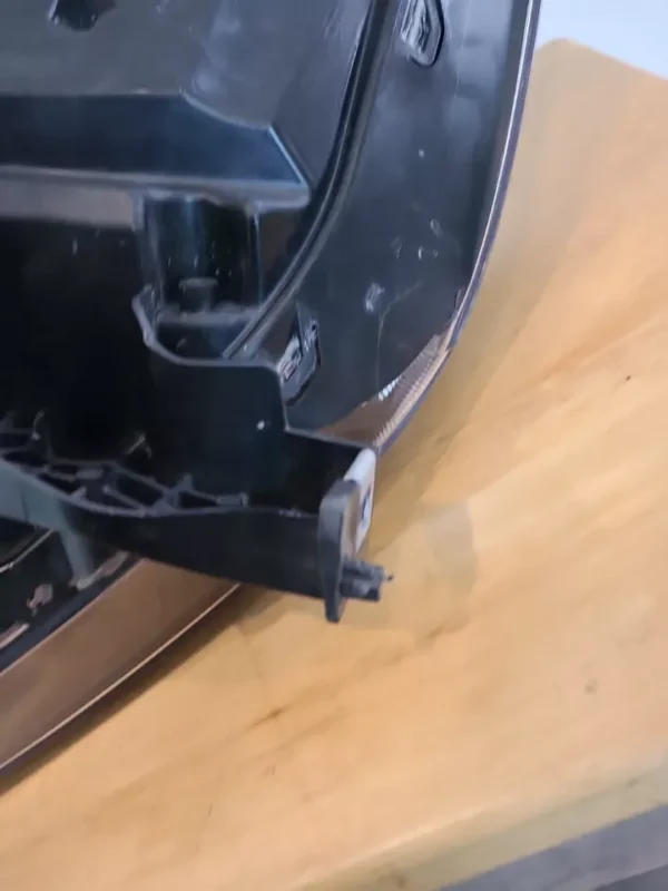 A close up of the bottom part of a car.