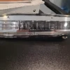 A close up of the front of an old car
