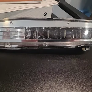 A close up of the front of an old car