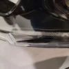 A pair of glasses sitting on top of a table.