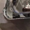 A close up of the bottom of a plastic container.