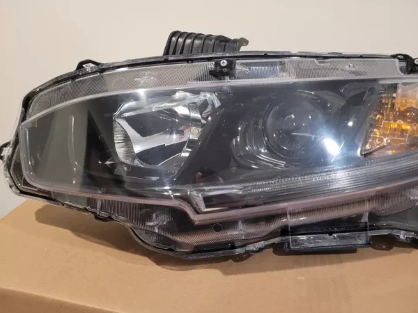 A close up of the headlight on a car