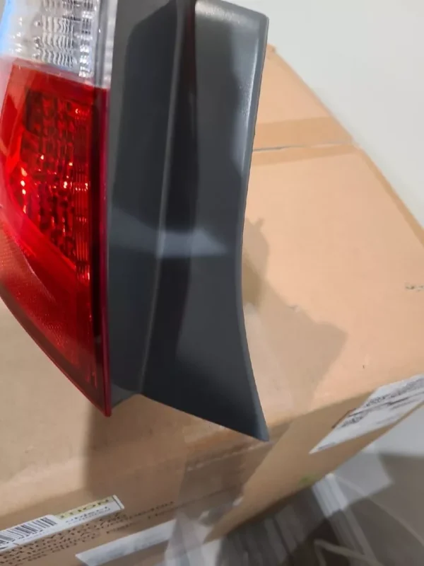 A close up of the tail light on a car