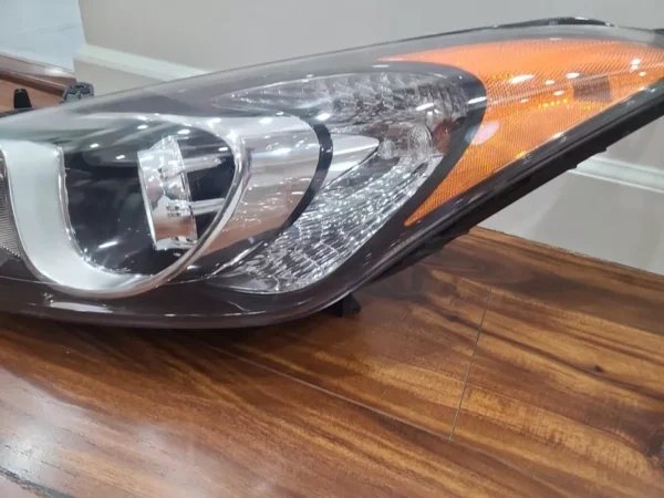 A close up of the headlight on a car