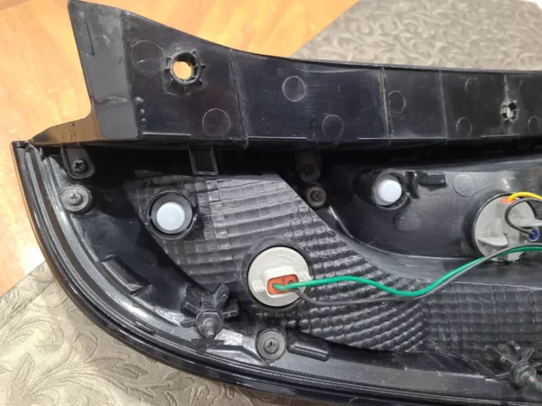 A close up of the bottom of an electric scooter.