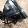 A black object with blue writing on it.