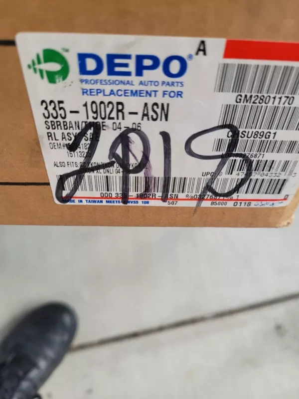 A box of some kind of item with the number 2 9 1 3 written on it.