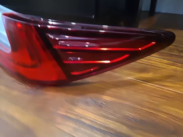 A close up of the tail light on a car