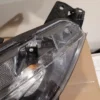 A close up of the headlight on a car