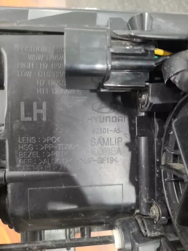 A close up of the engine cover on an old motorcycle.