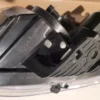 A close up of the bottom part of a circular saw blade.