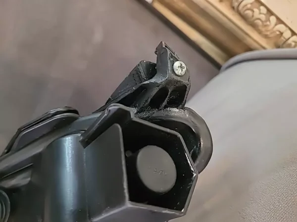 A close up of the side of a gun