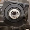 A close up of the front wheel bearing on a car