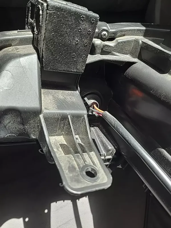 A close up of the seat belt on a car